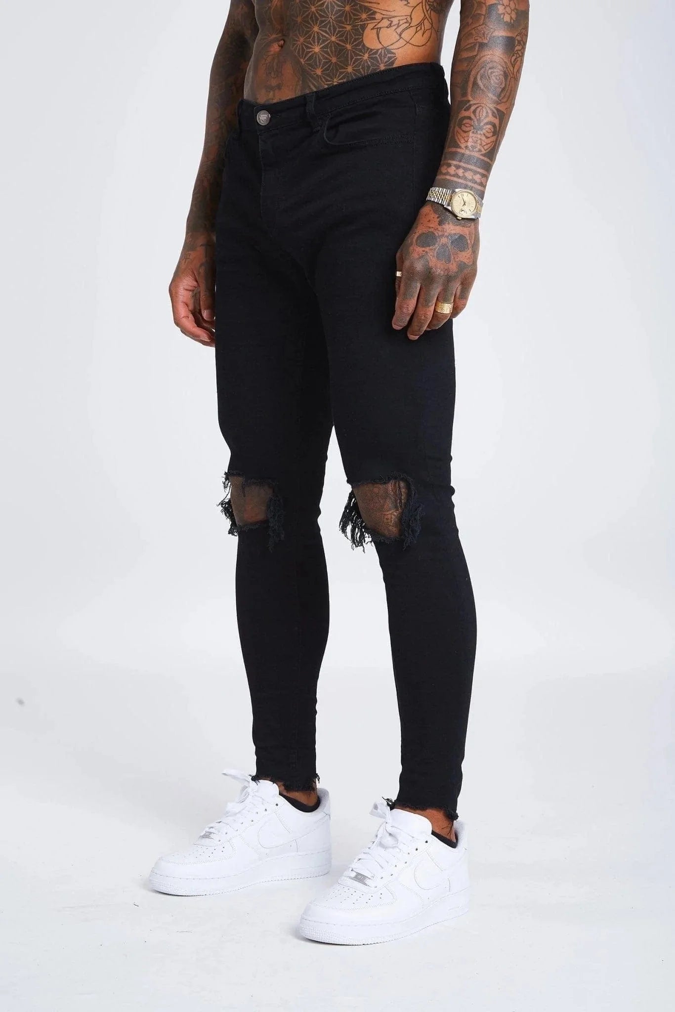 SKINNY FIT JEANS DESTROYED KNEE - BLACK