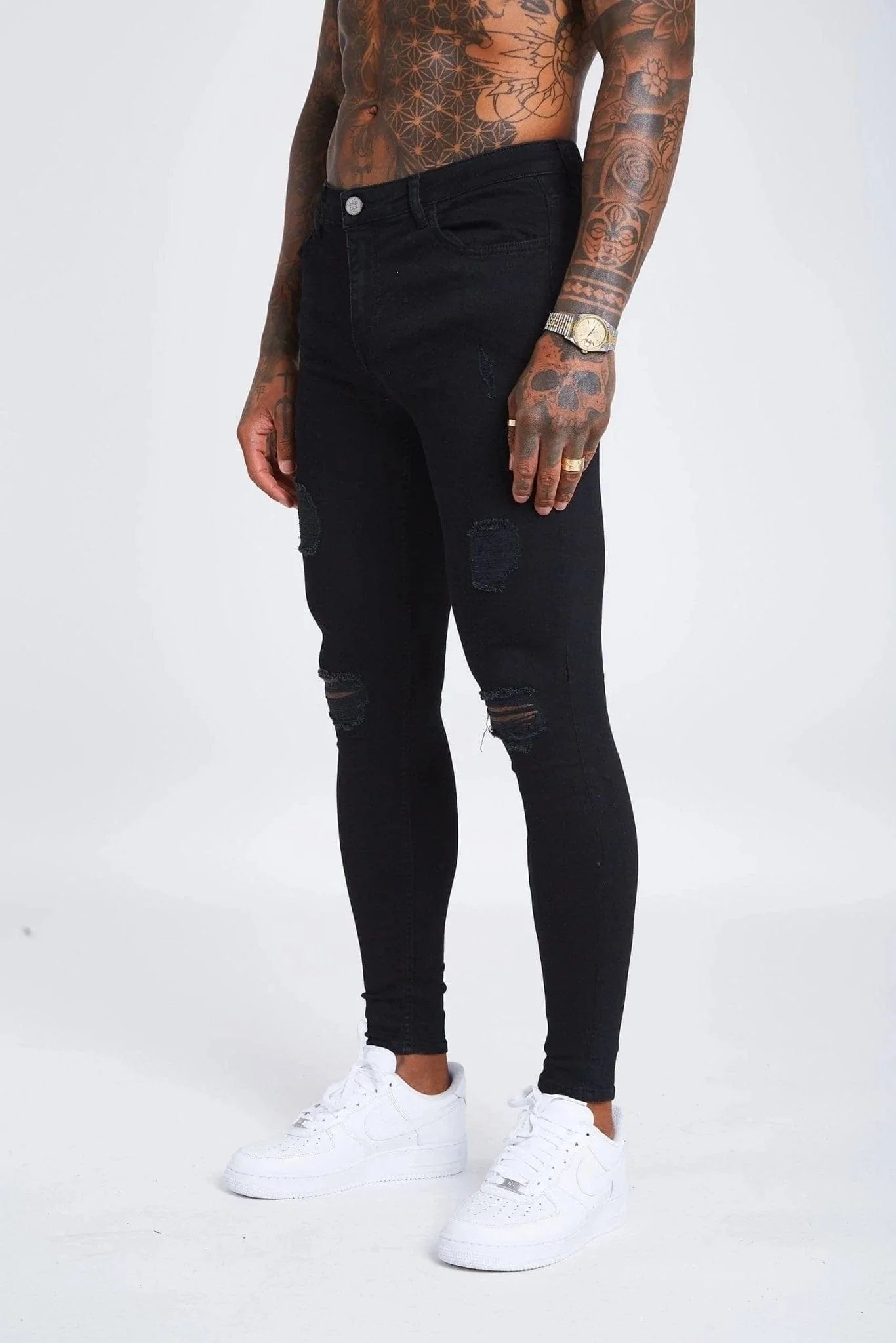 JEAN SKINNY FIT DÉCHIRÉ ET RÉPARÉ - NOIR