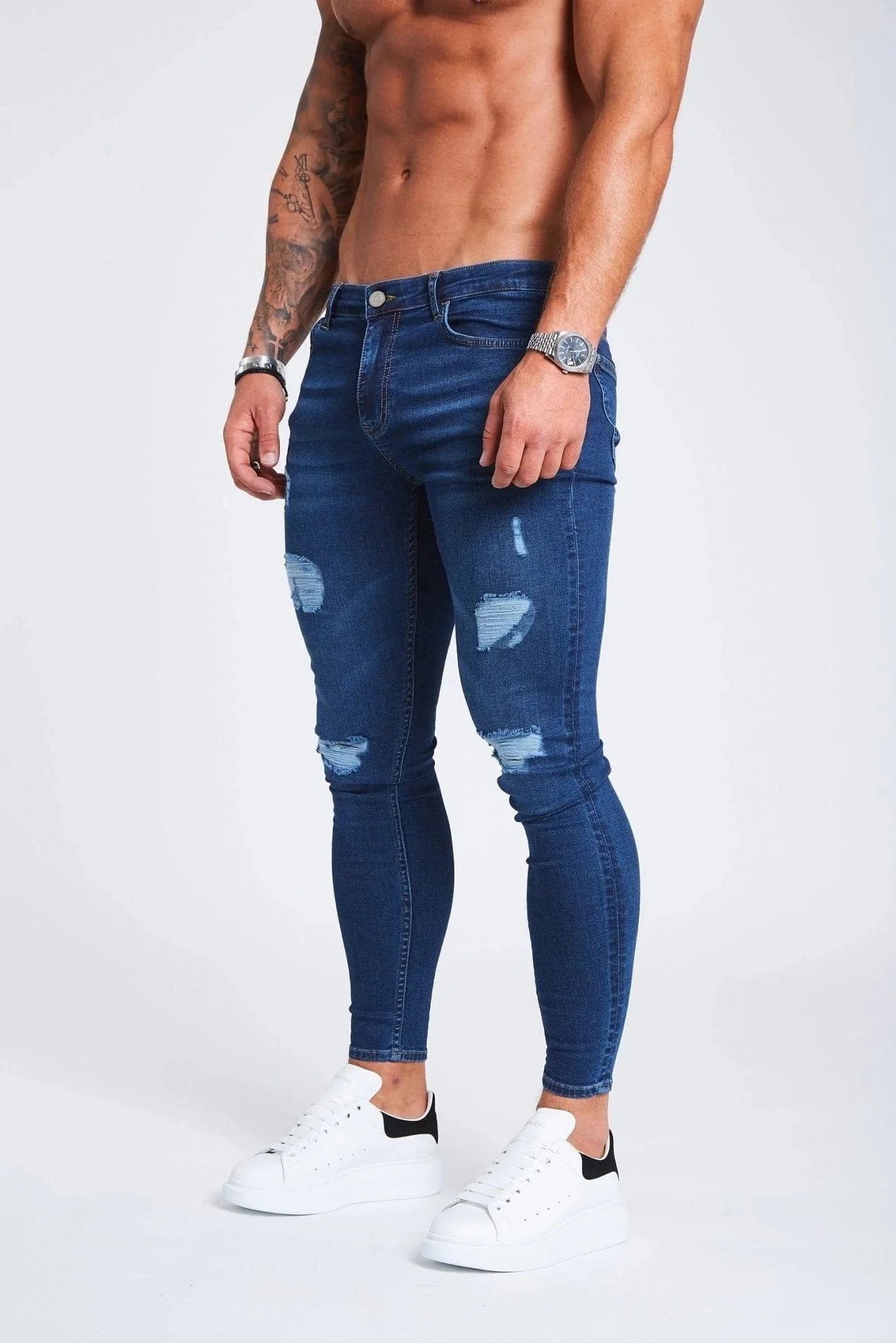 SKINNY FIT JEANS RIPPED AND REPAIRED - DARK BLUE