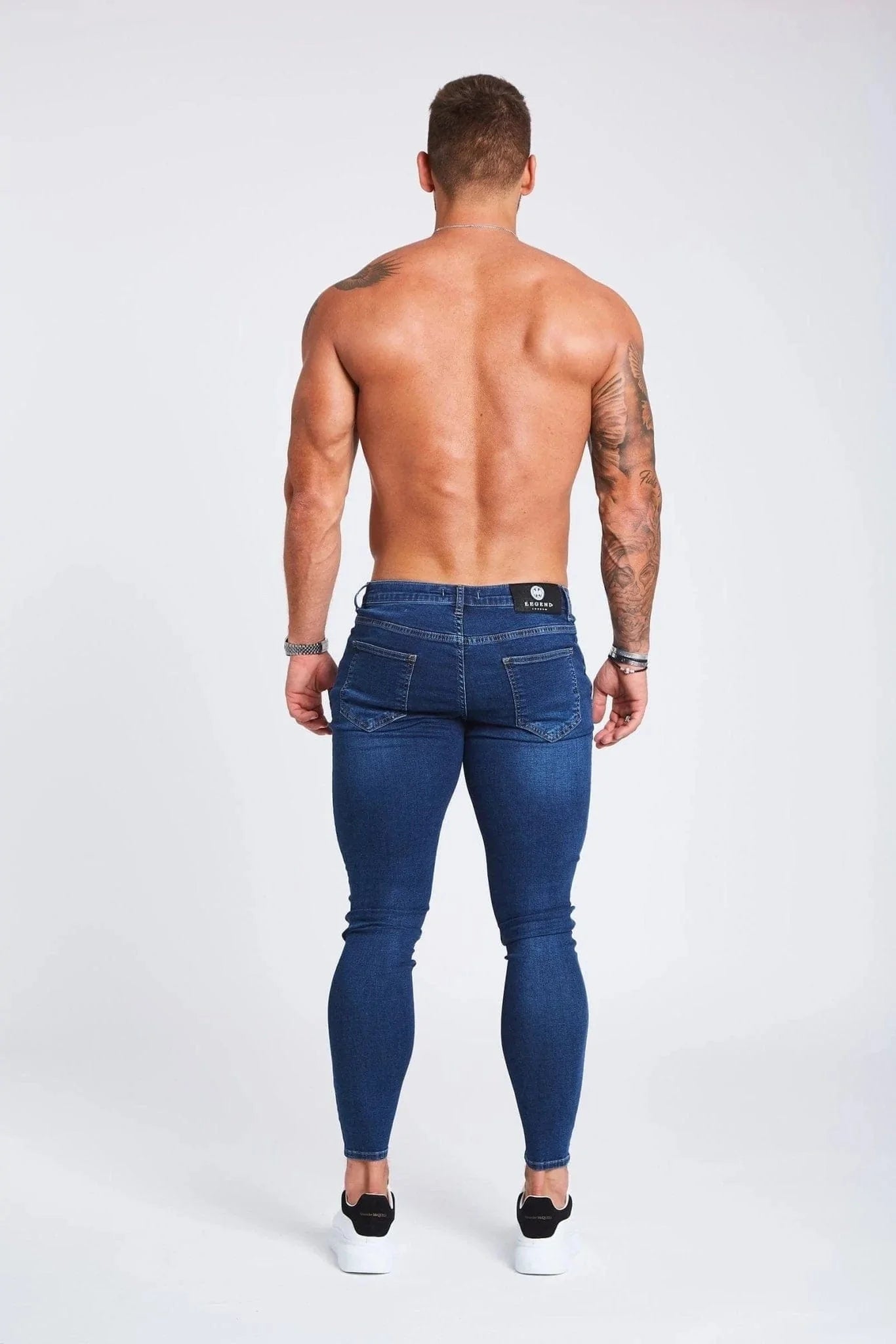 SKINNY FIT JEANS RIPPED AND REPAIRED - DARK BLUE