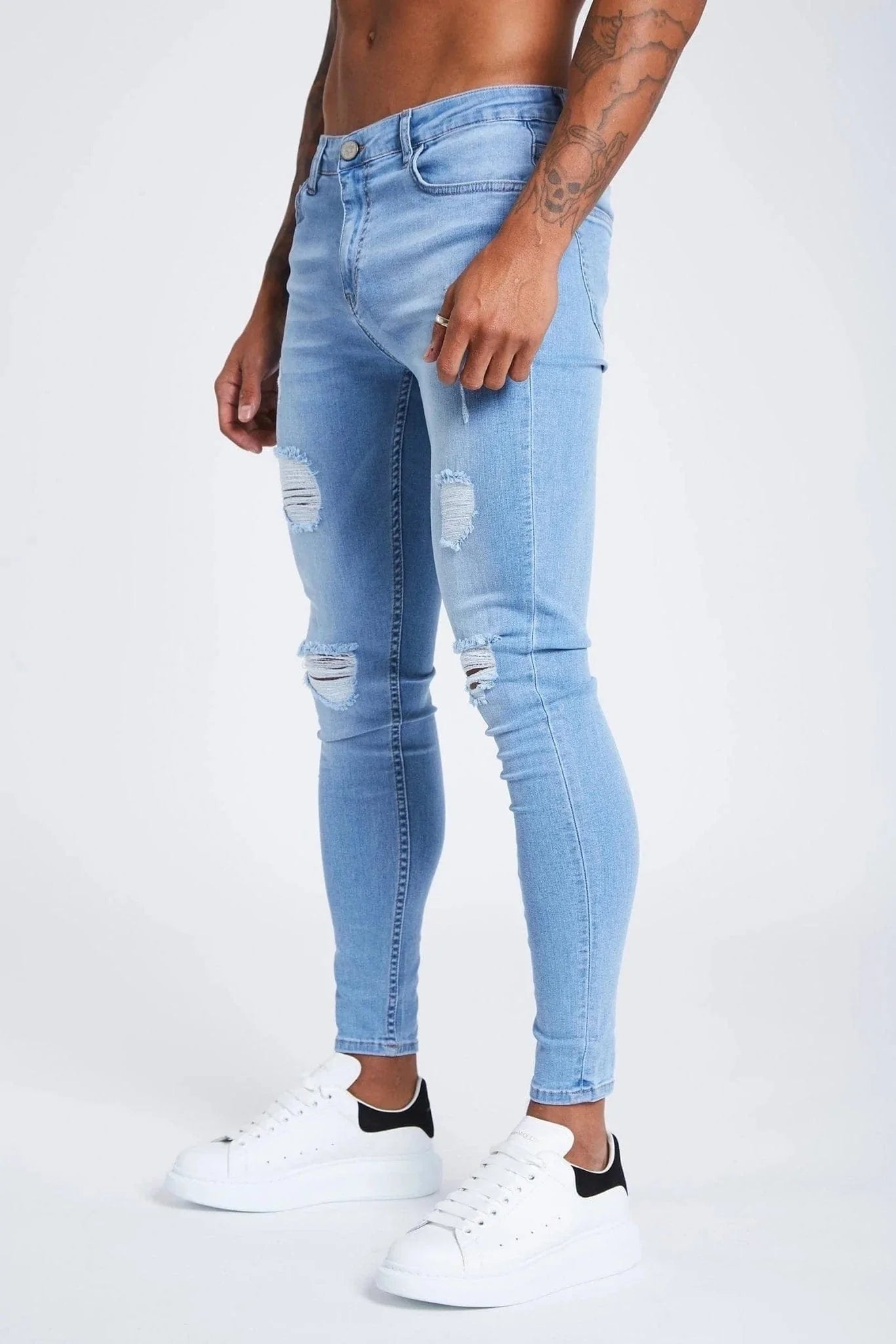 SKINNY FIT JEANS RIPPED AND REPAIRED - LIGHT BLUE