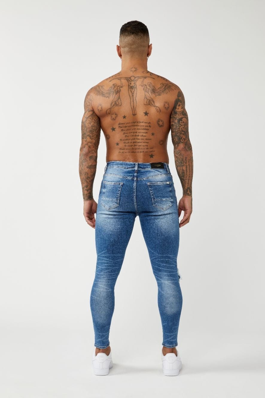 PREMIUM SKINNY FIT JEANS DESTROYED KNEE - MID BLUE WASH