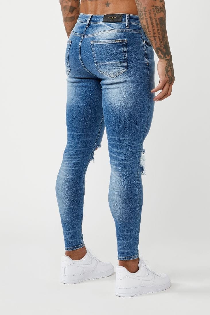 JEAN SKINNY FIT PREMIUM GENOU DÉTRUIT - DÉLAVAGE BLEU MOYEN