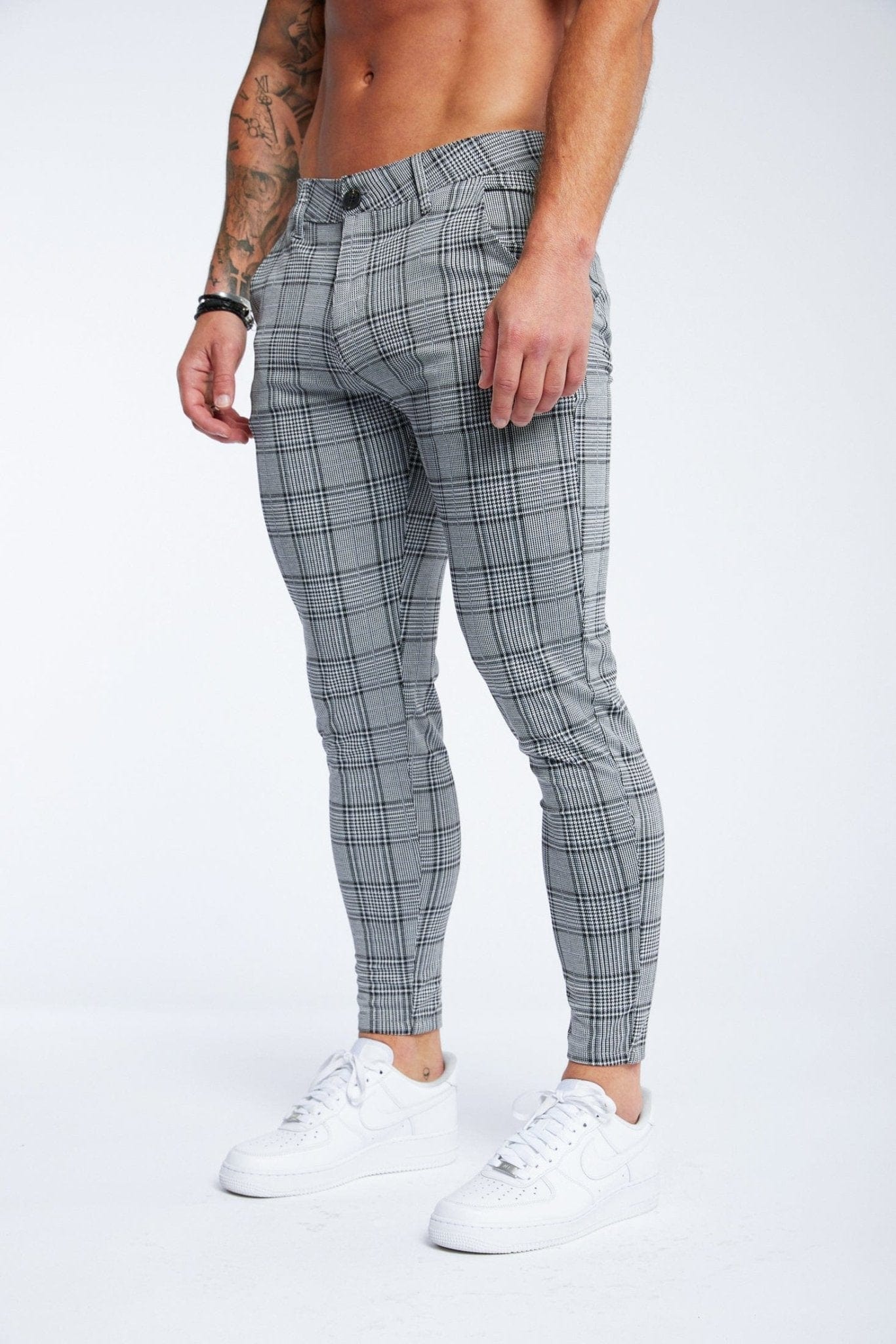 PANTALON À CARREAUX GRIS À pulvériser